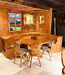 Stube circular seating | Austrian dining area | Round sofa + table and chairs