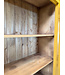 Yellow vintage wooden display cabinet