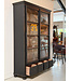 Black vintage wooden display cabinet with old glass
