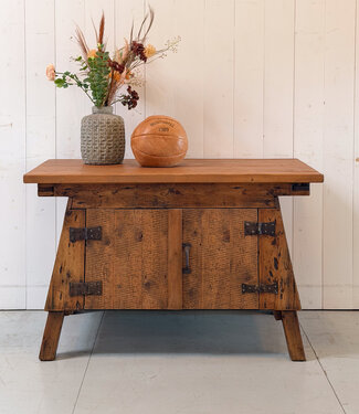 Vintage wooden workbench with doors
