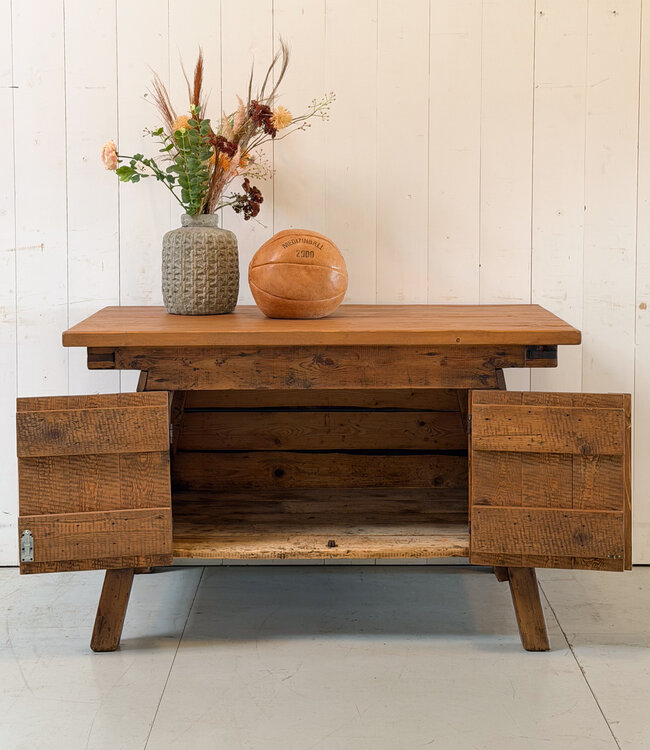 Vintage wooden workbench with doors