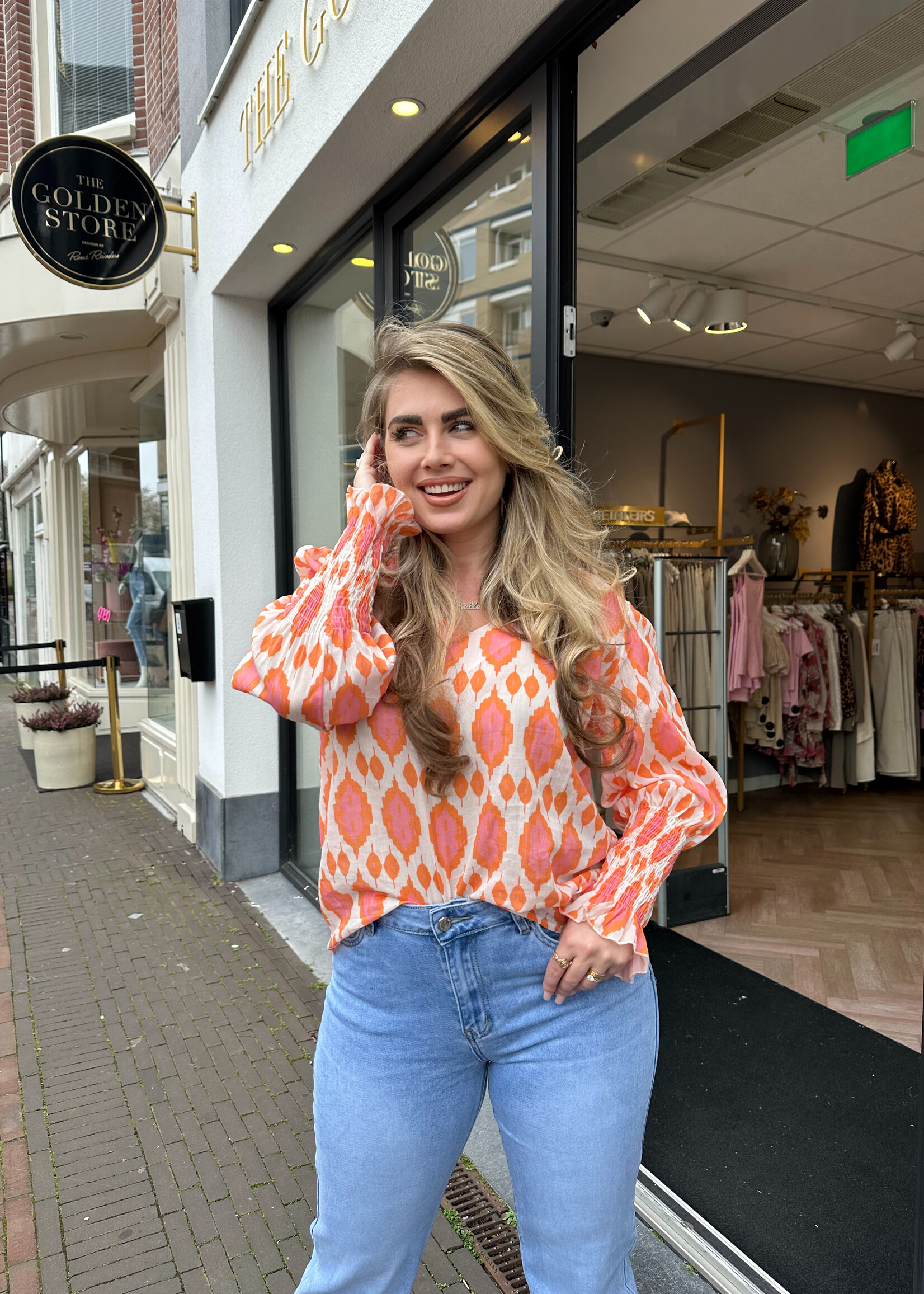 Blouse met V-hals Oranje | Vera