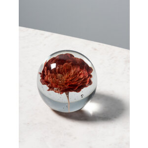 Paperweight with red yellow flower