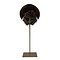 Horseshoe crab on golden pedestal