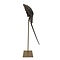 Horseshoe crab on golden pedestal