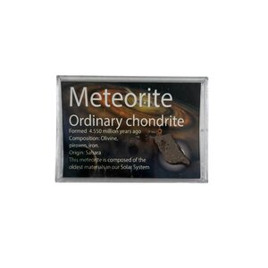 Meteorite fragment in box (Sahara)