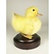 Mounted yellow duck on pedestal