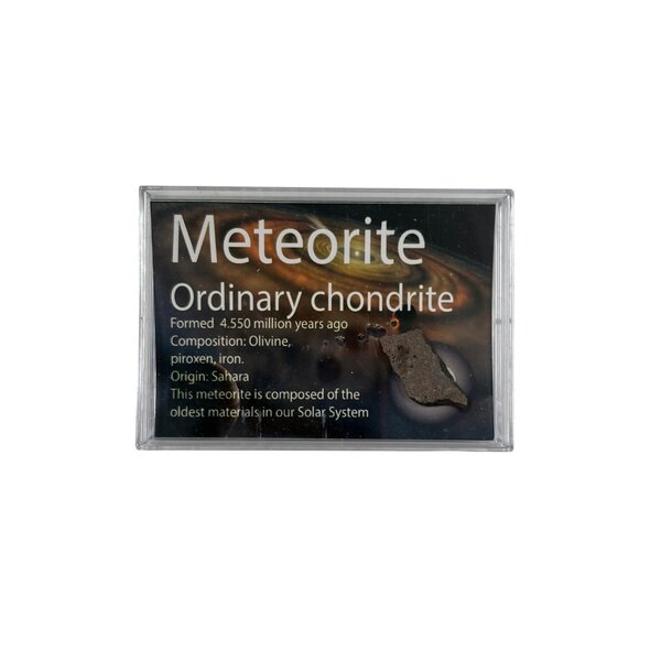 Meteorite fragment in box (Sahara)