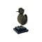 Mounted dark duckling on pedestal