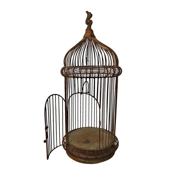 Antique bird cage on stand