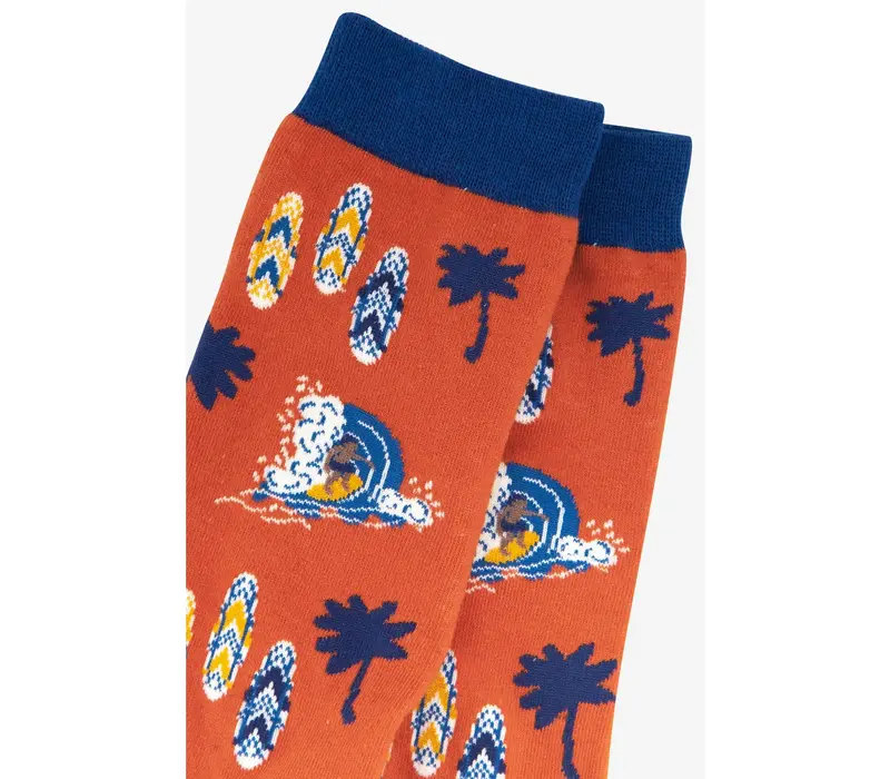 Sock Talk Surfer catching a wave 40/46