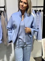 Hemelsblauw jasje met rits