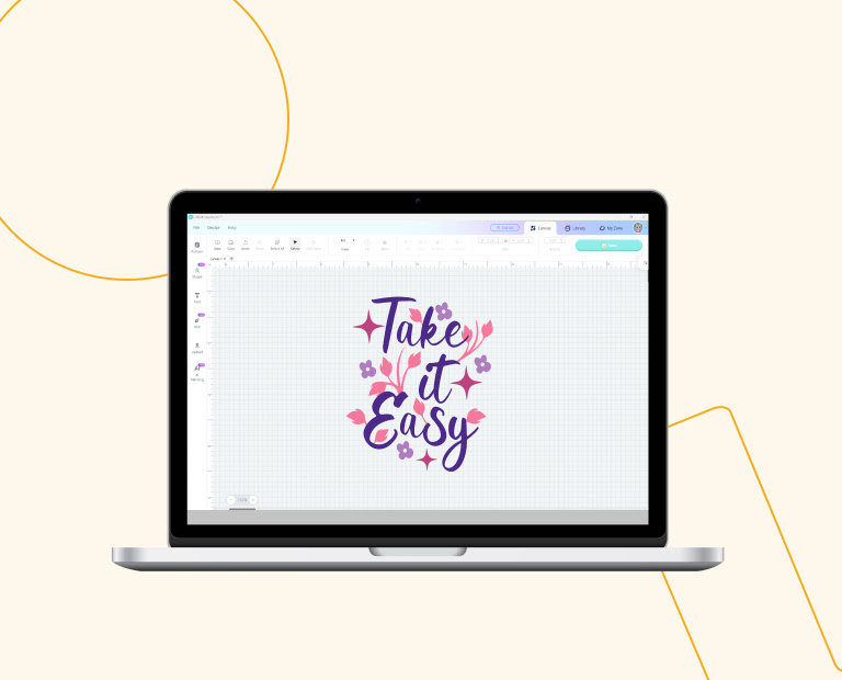 An laptop with LOLiK IdeaStudio open. It shows a design with the text 'Take it Easy' in dark purple with lilac flowers and pink stars scattered around it.