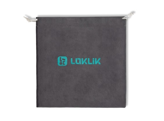 Top view of the grey empty fabric drawstring LOKLiKImPress™ Mini 3 travel bag