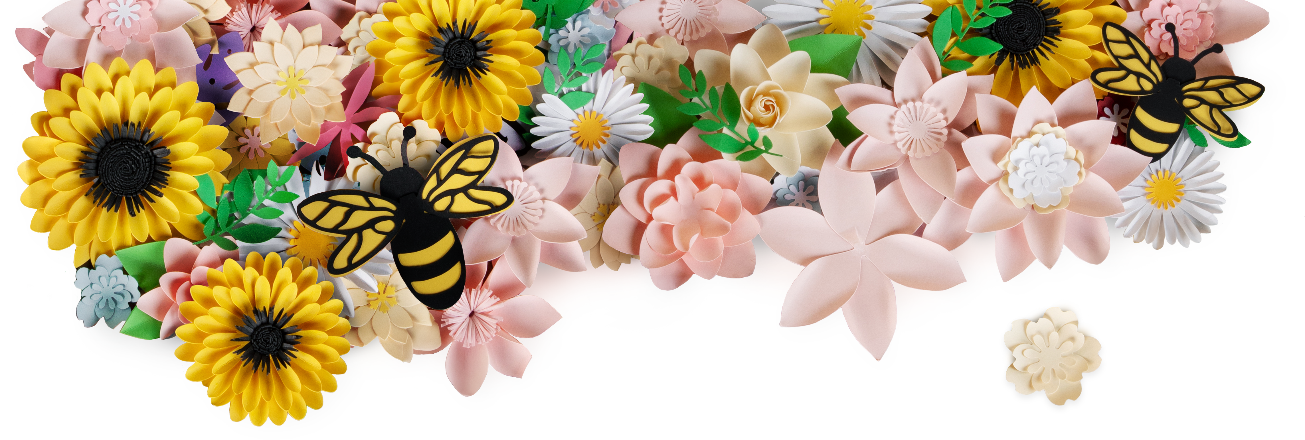 Arrangement of different smaller and larger papercut flowers, small leaves and two bees.