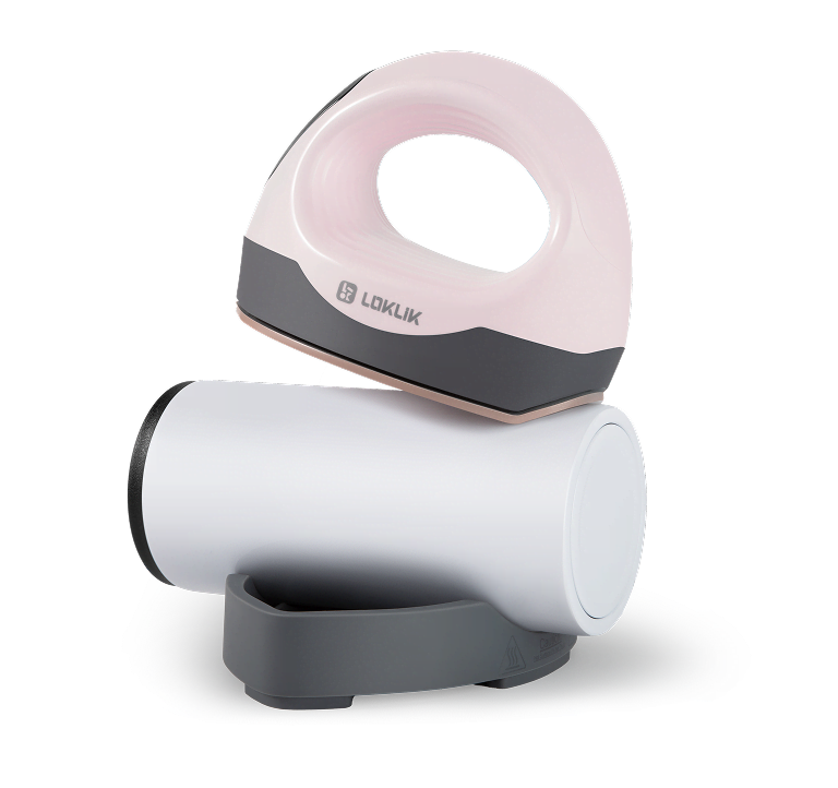 LOKLiK ImPress™ Mini 3 in Pastel Pink on top of a tumbler placed onto the safety base to keep it secure while ironing.