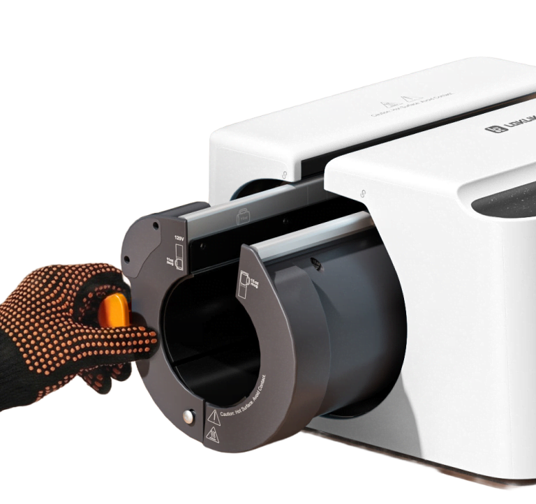Hand wearing the safety glove sliding the heat plate into the LOKLiK Auto Mug Heat Press.