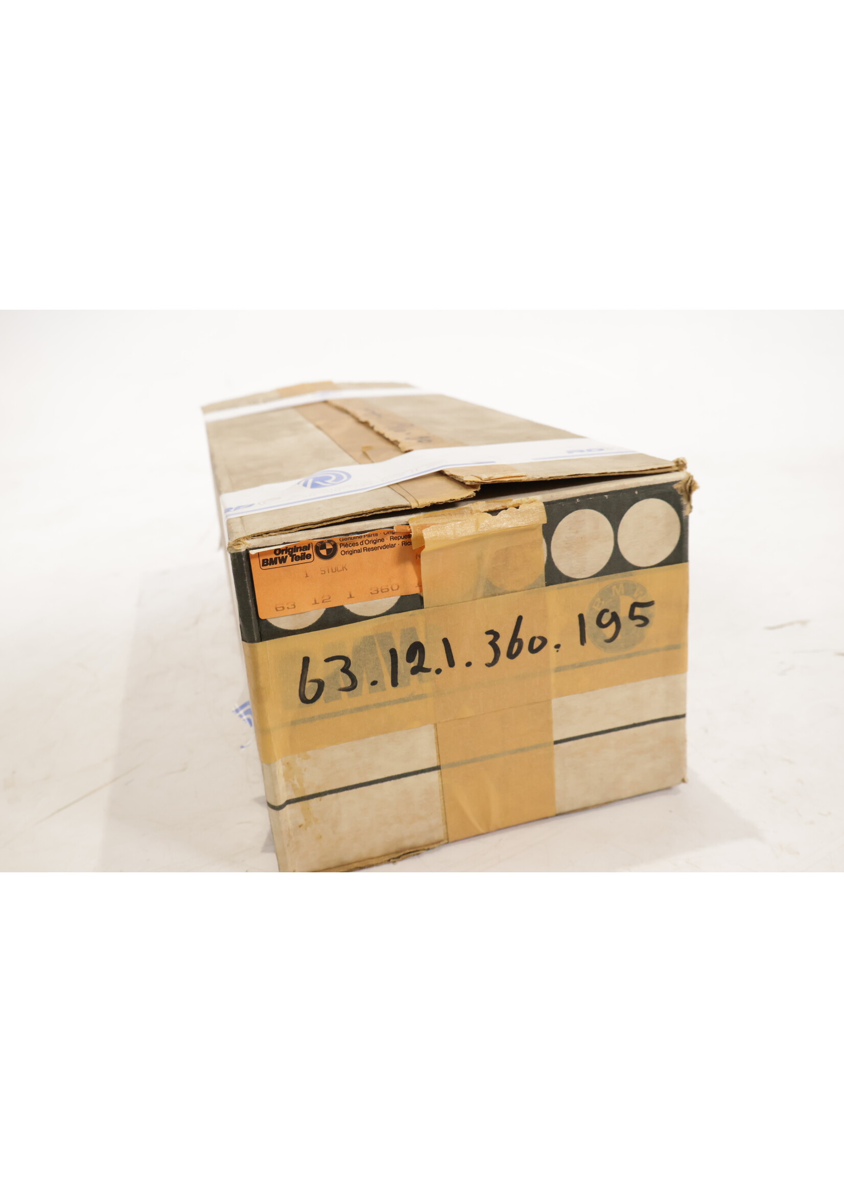 BMW BMW E12 5er OEM Scheinwerfer links NEU! 63121360195