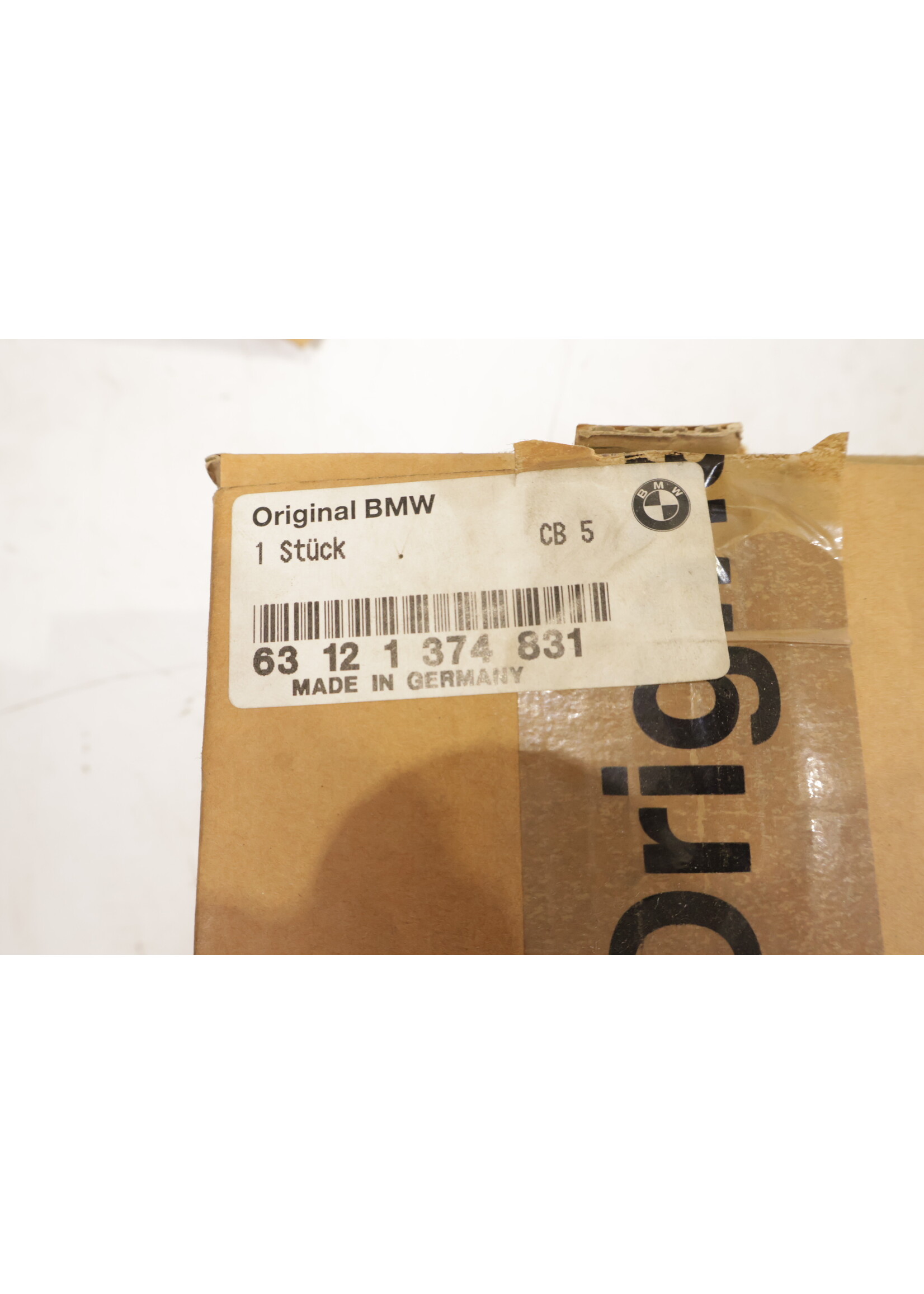 BMW BMW E24 6 Series OEM Headlight Hella yellow NEW! 63121374831 1374831