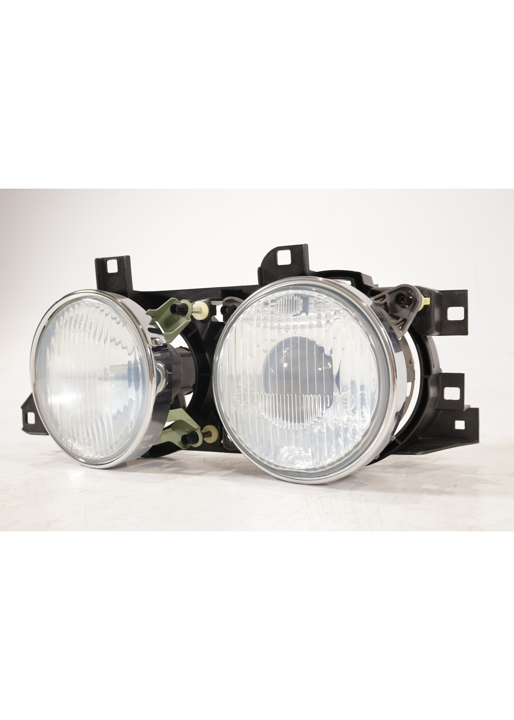 BMW BMW E34 5 Series OEM Headlight HELLA left NEW! 1dl005000 63121378359