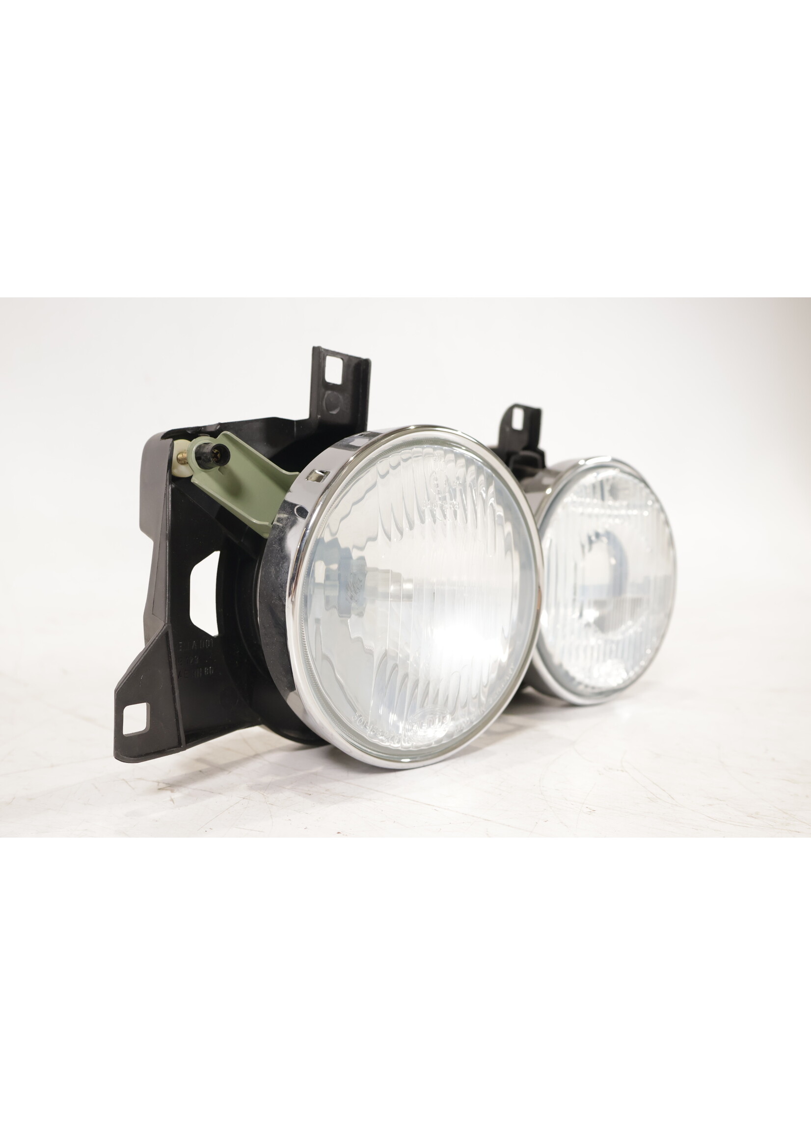 BMW BMW E34 5 Series OEM Headlight HELLA left NEW! 1dl005000 63121378359