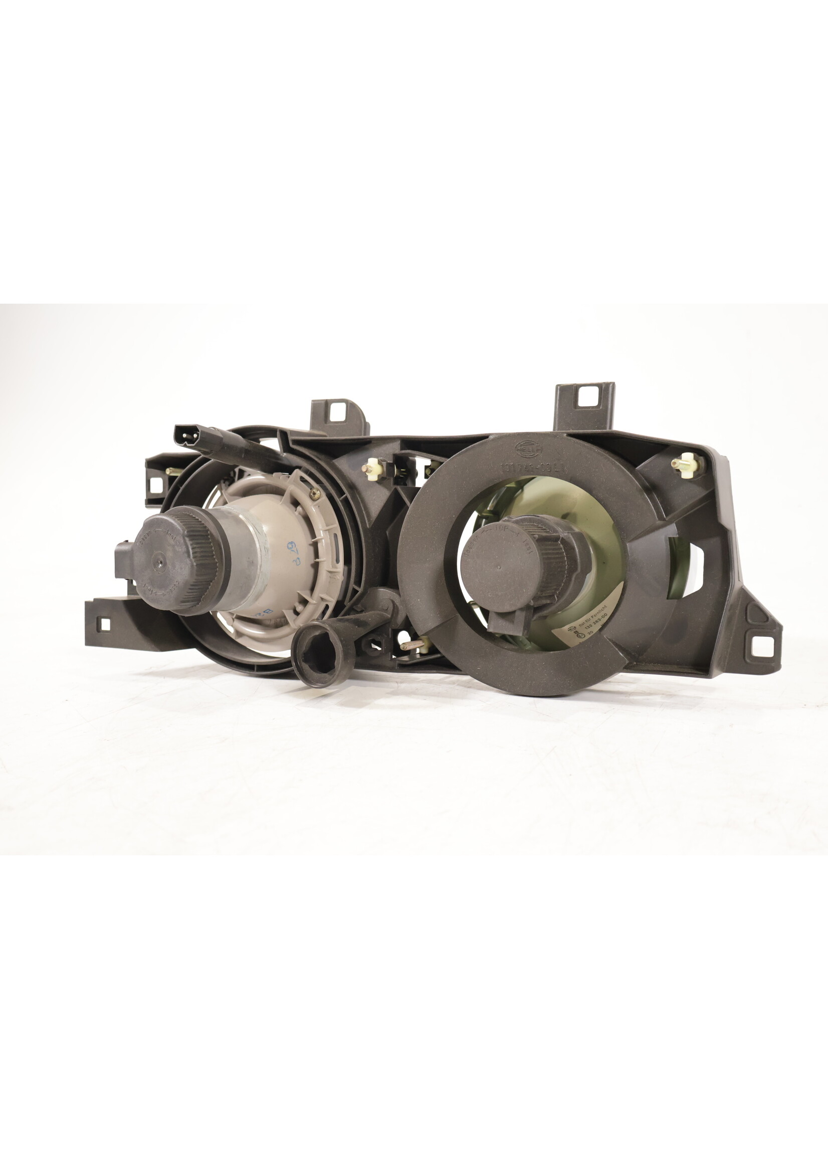 BMW BMW E34 5 Serie OEM Koplamp HELLA links NIEUW! 1dl005000 63121378359