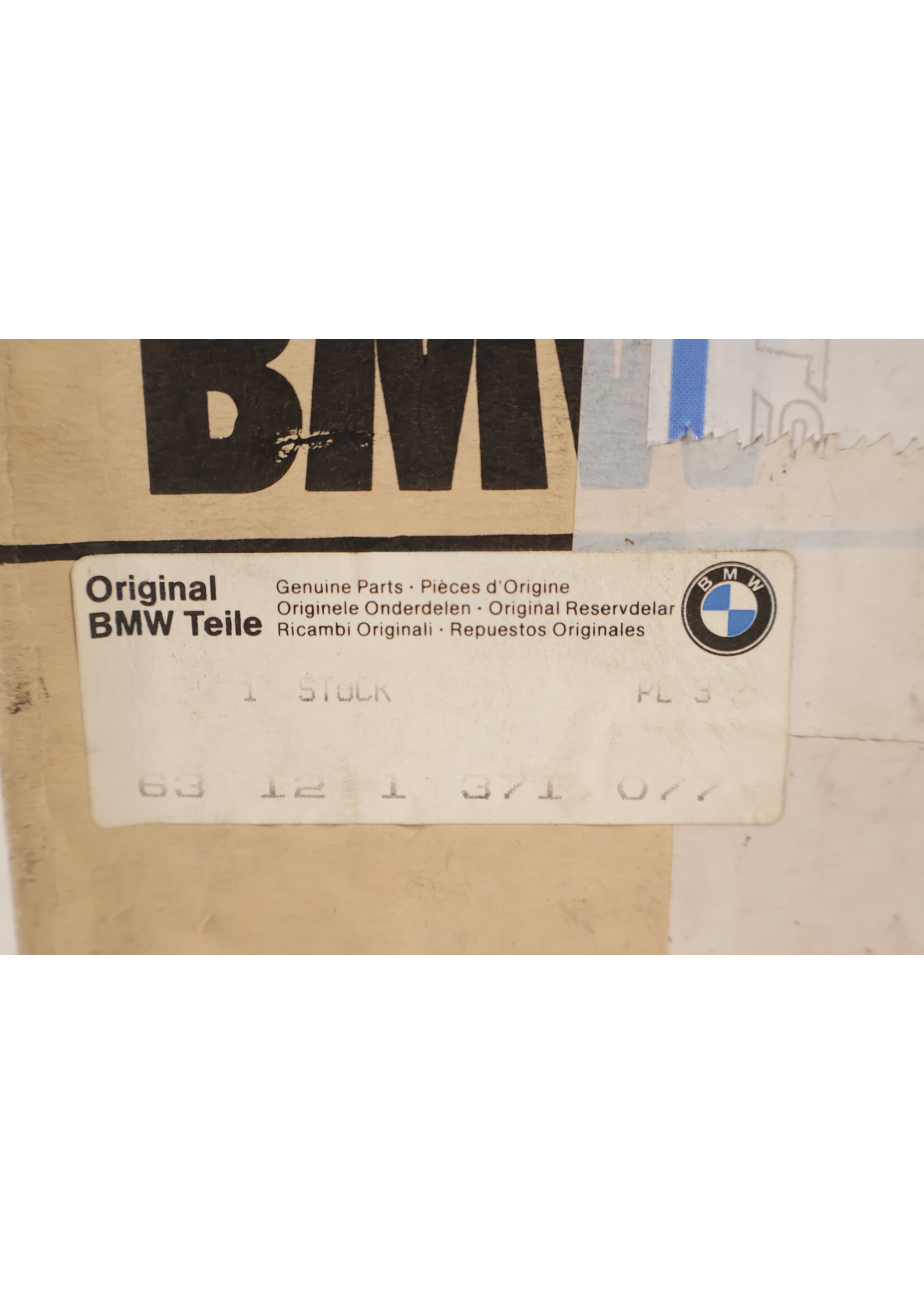 BMW BMW E23 7er OEM Scheinwerfer links NEU! 63121371077