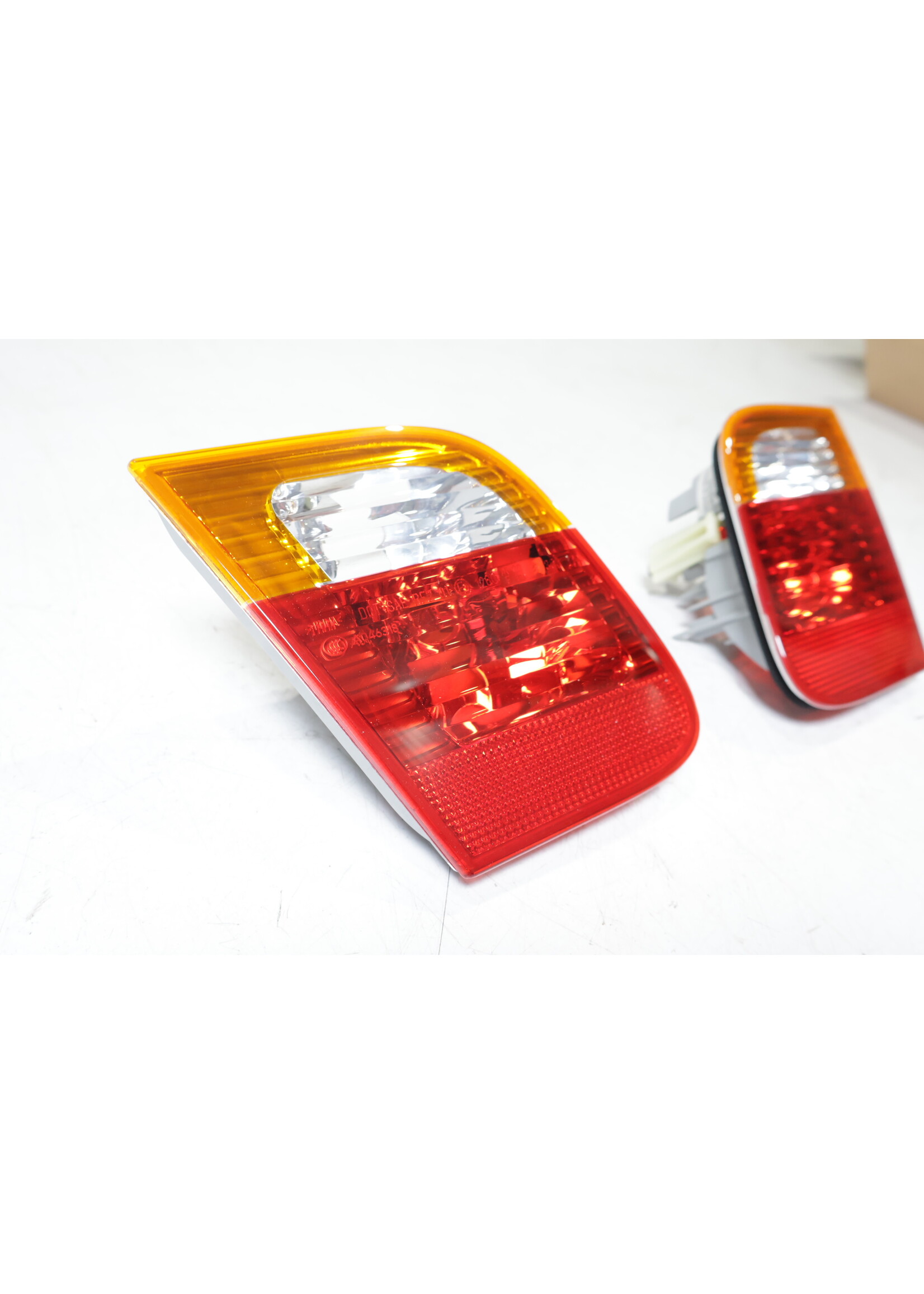 BMW BMW 3 Series E46 OEM Taillight inside set type 2 NEW! 63216907946 63216907945