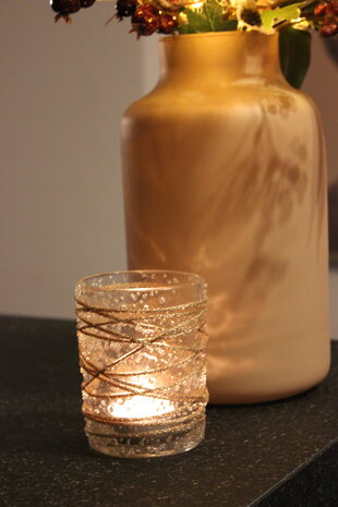 Kerstboeket, vaas, lichtje