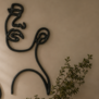 Wandornament FACE mat zwart - Verkrijgbaar in 2 maten