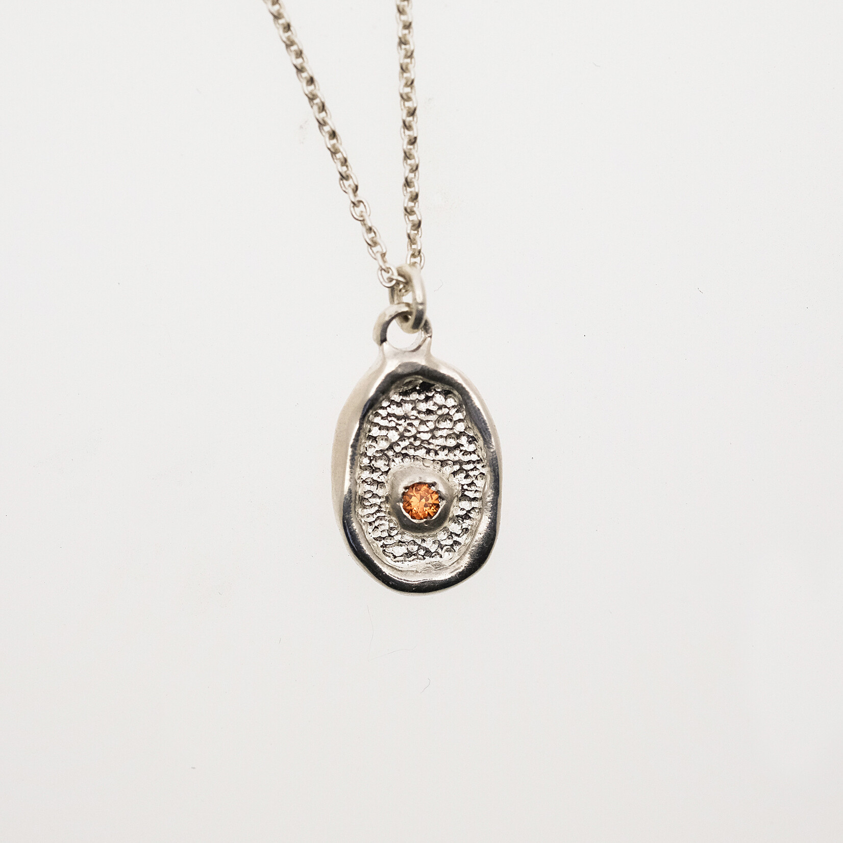 Ketting Jamie met oranje saffier