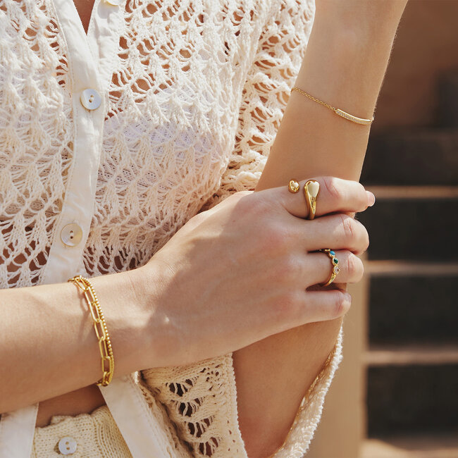 Goudvergulde rechthoekige schakelarmband met kristal steentjes 18,5 cm