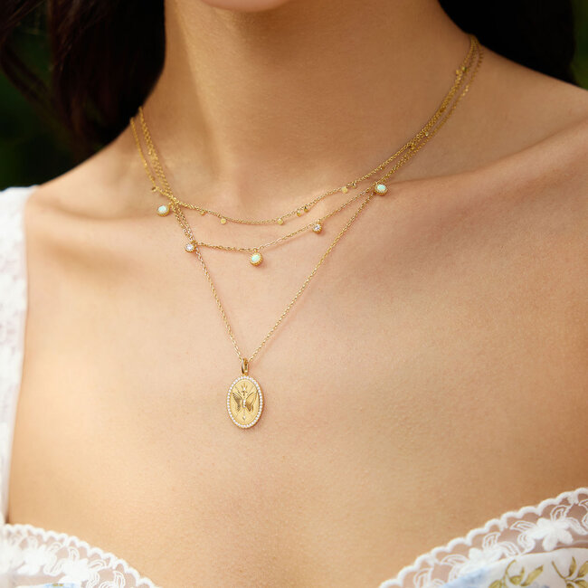 Goudvergulde anker schakelketting met een opaal steentje 47,5 cm