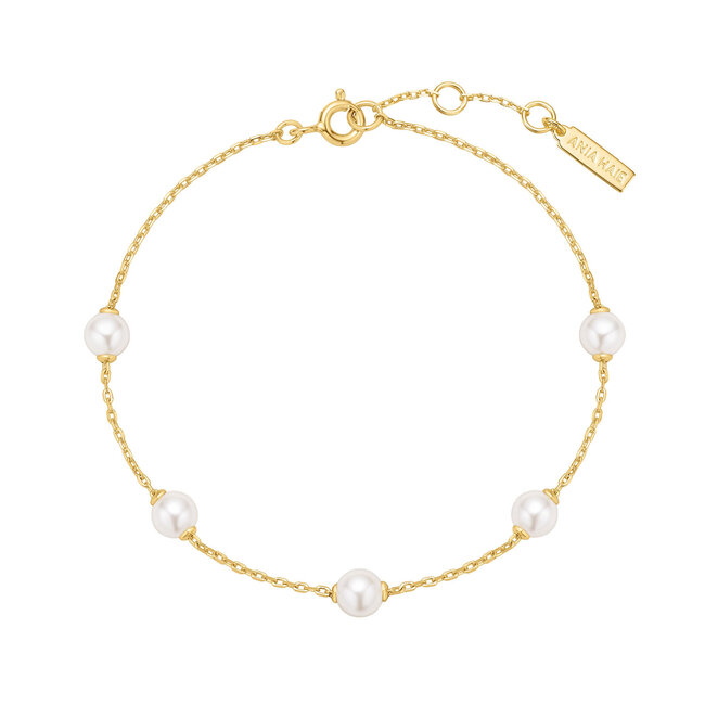 Goudvergulde twist schakelarmband met een zoetwaterparel 18,5 cm