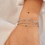 Zilveren anker schakelarmband met een turkoois steentje