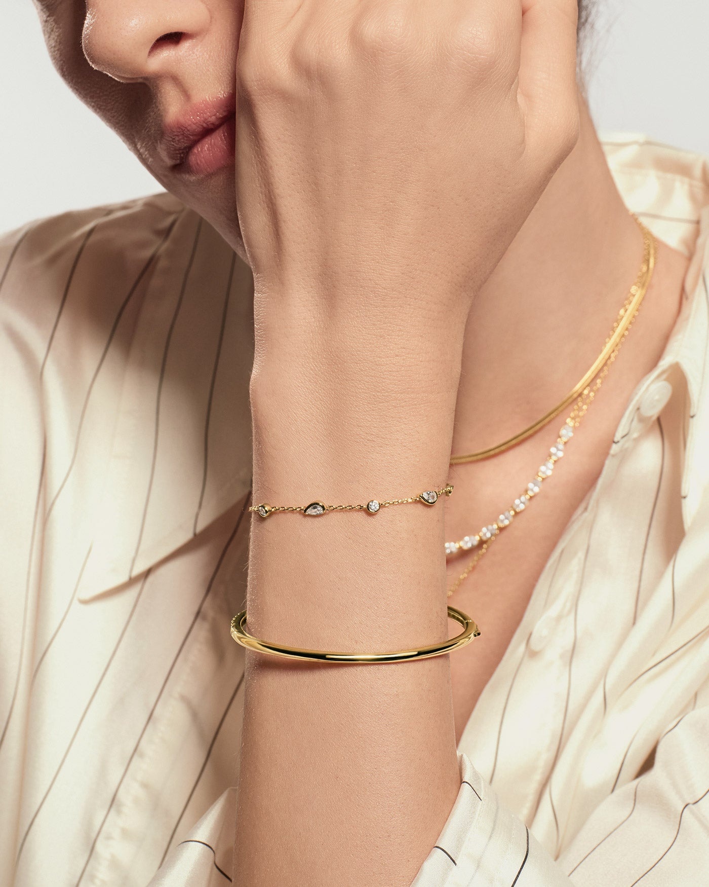 Goudvergulde armband met ronde en druppelvormige zirkonia 18,5 cm-3