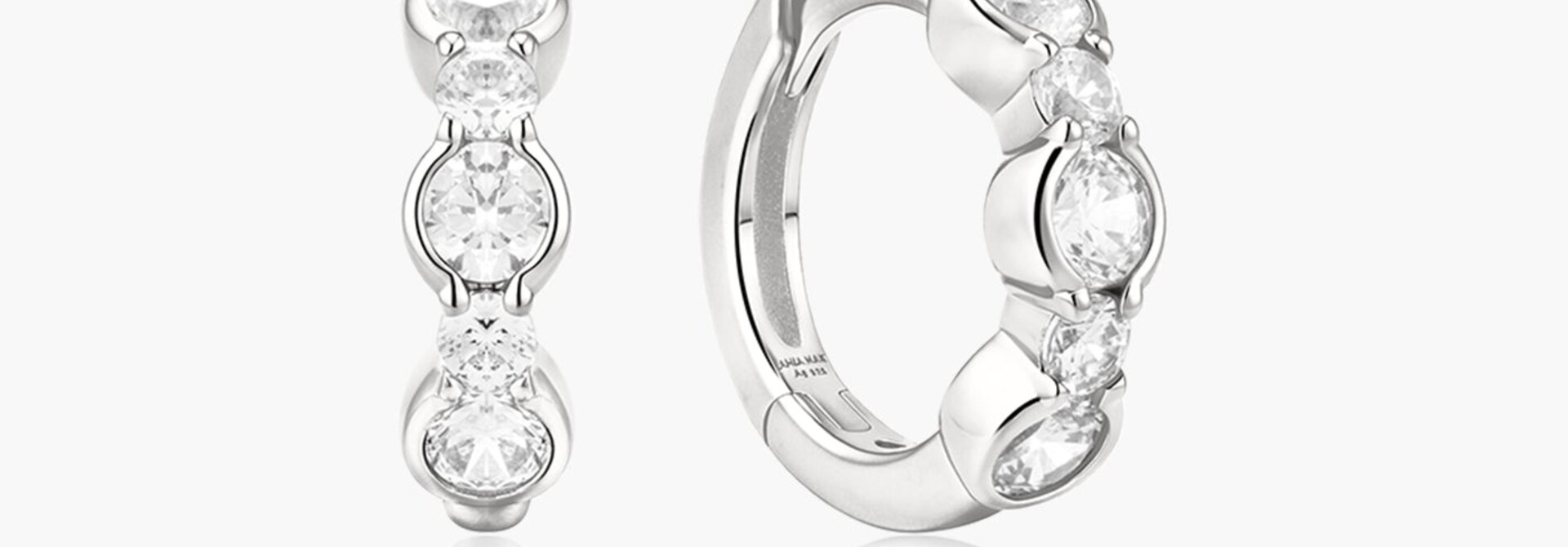 Zilveren huggie oorringen met zirkonia 8,5 mm