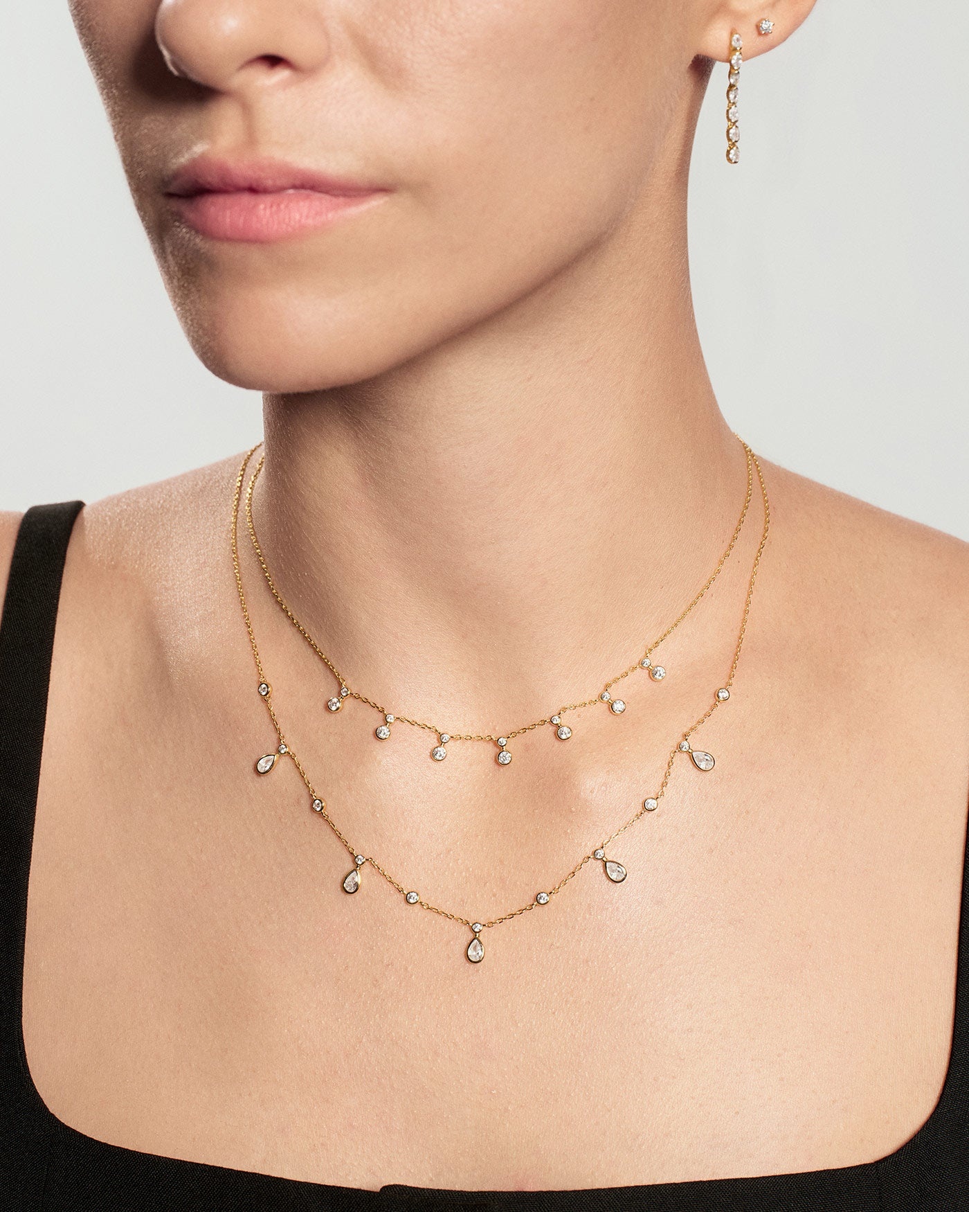 Goudvergulde stationketting met ronde en druppelvormige zirkonia 45,5 cm-2