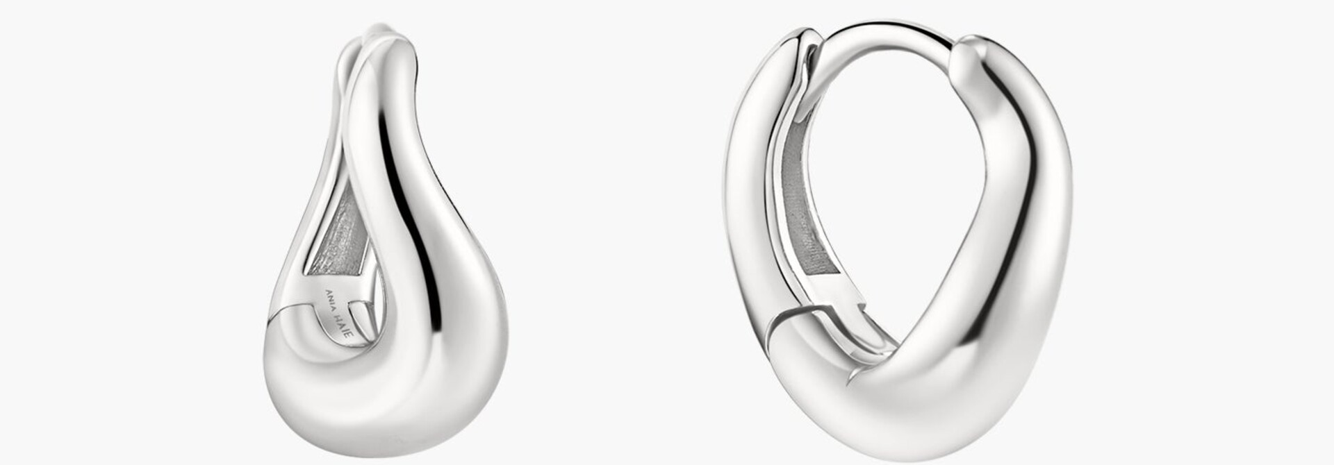 Zilveren golvende huggie oorringen 13 mm