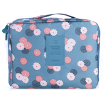 Toilettas #HappyHoliday - Blauw Bloem