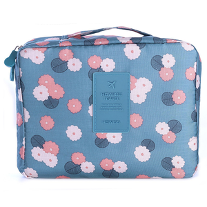 Toilettas #HappyHoliday - Blauw Bloem