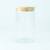 Glazen cylinderpot met geribbelde binnenzijde en houten deksel