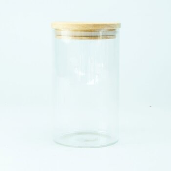 Glazen cylinderpot met geribbelde binnenzijde en houten deksel