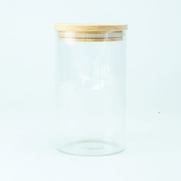 Glazen cylinderpot met geribbelde binnenzijde en houten deksel