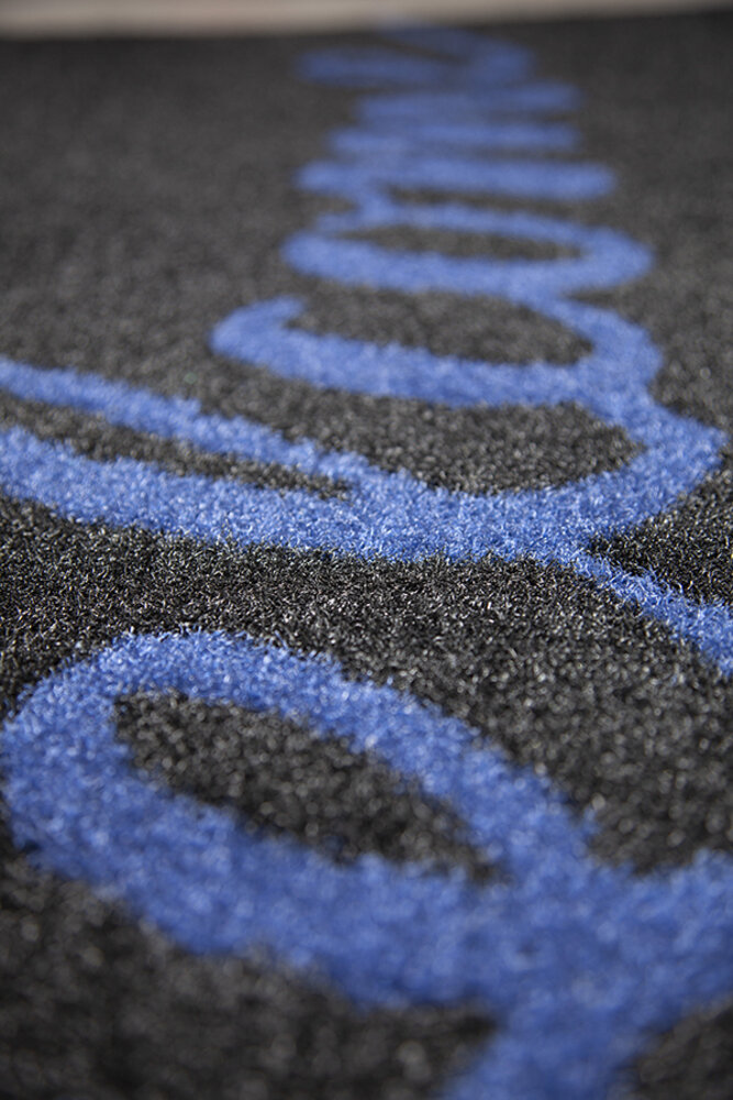 Mattenexpert Optibruch logo mat buiten Mattenexpert Optibruch logo mat buiten