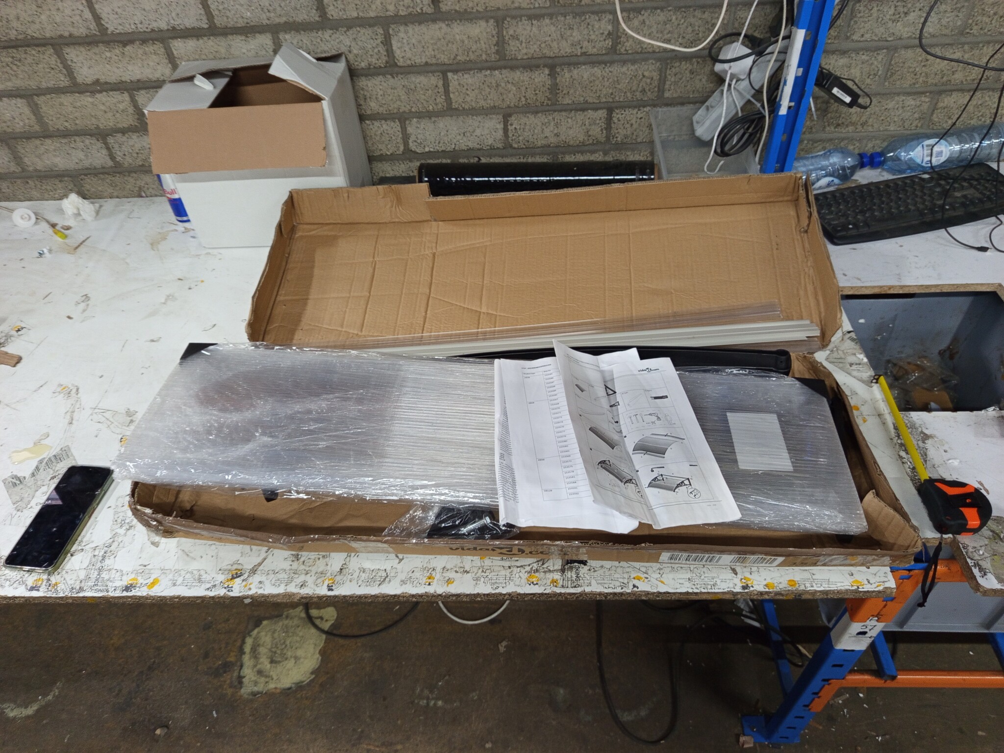 Deurluifel Polycarbonaat Zwart/Transparant 100x75 cm - 55% Korting!