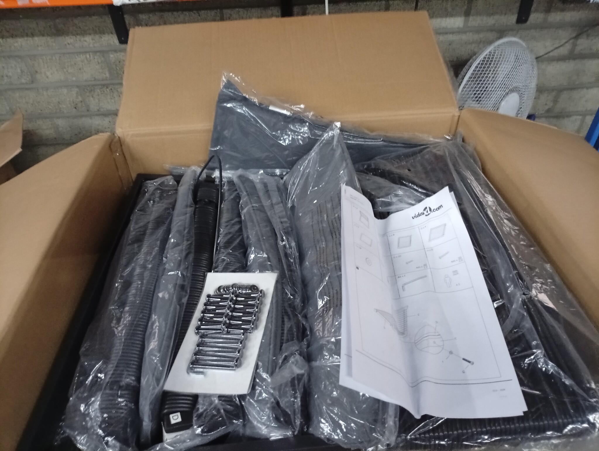 vidaXL Tuinstoelen 4 st met kussens poly rattan zwart