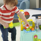 Fisher-Price - Lachen en leren, 3-in-1, duwspeelgoed voor eerste stappen en muzikaal activiteitencentrum, speelgoed voor kinderen van 9-36 maanden, HCK51