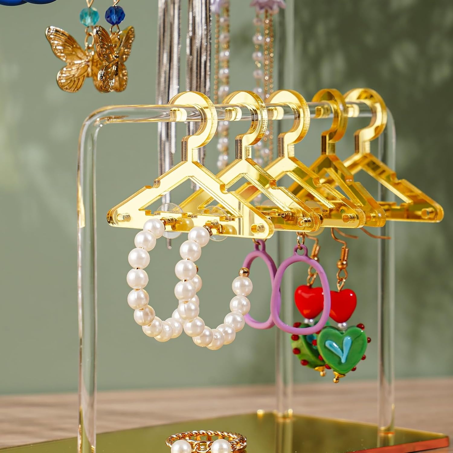 NiHome Acryl oorbelhouder met uniek tweetraps design, schattige miniatuur kleerhangers met ruime opbergruimte voor 48 paar, spiegeldisplay voor thuis wastafel en detailhandel