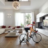 Sportneer Turbo Trainer, vloeibare fietstrainer, stalen fietsstandaard met geluidsreductiewiel voor indoor fietstrainer